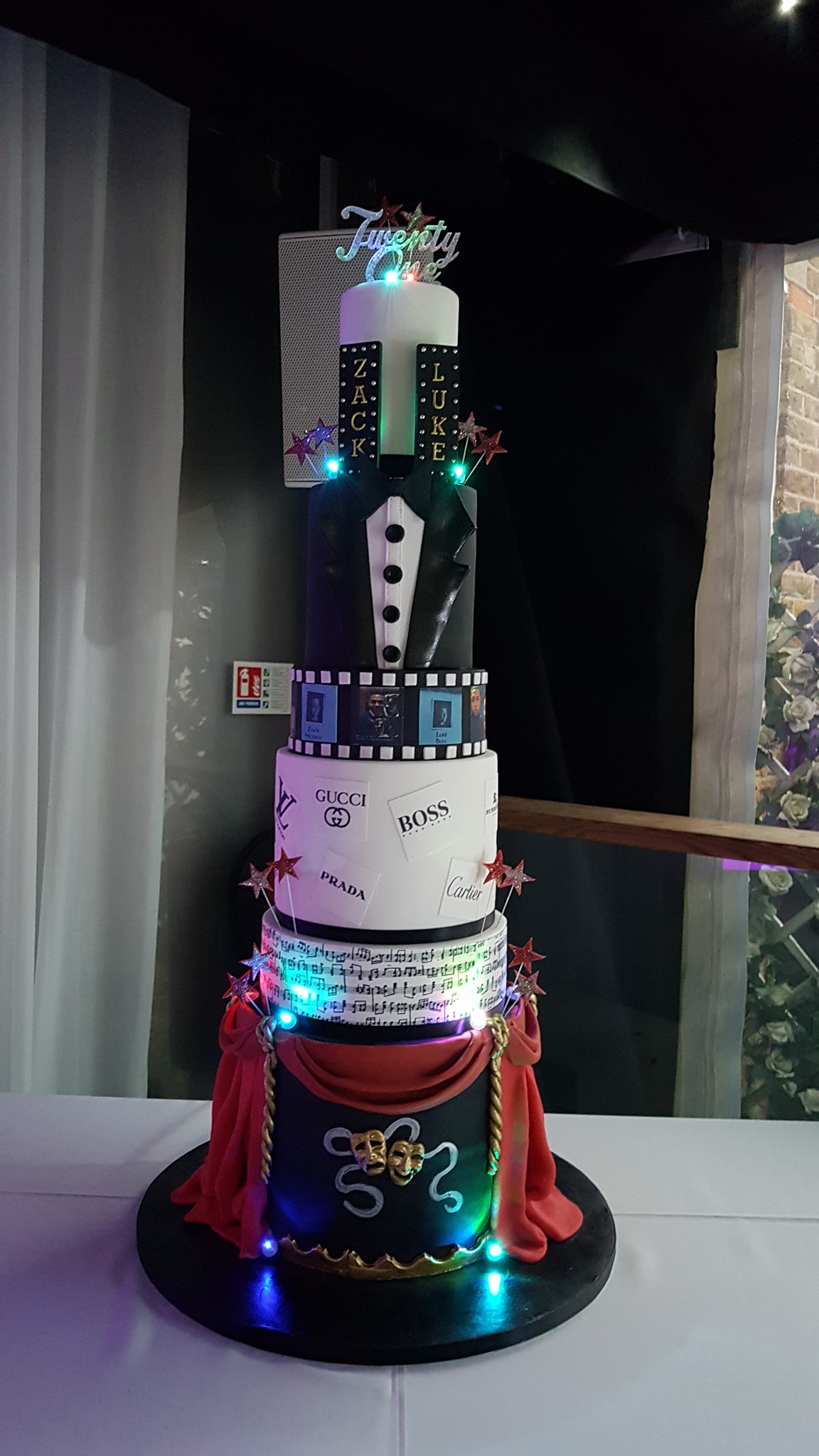 Six tier actor-inspired cake for Zack Morris and Luke's joint 21st birthday