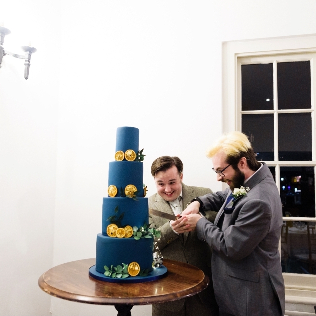 Wedding cake cutting moment