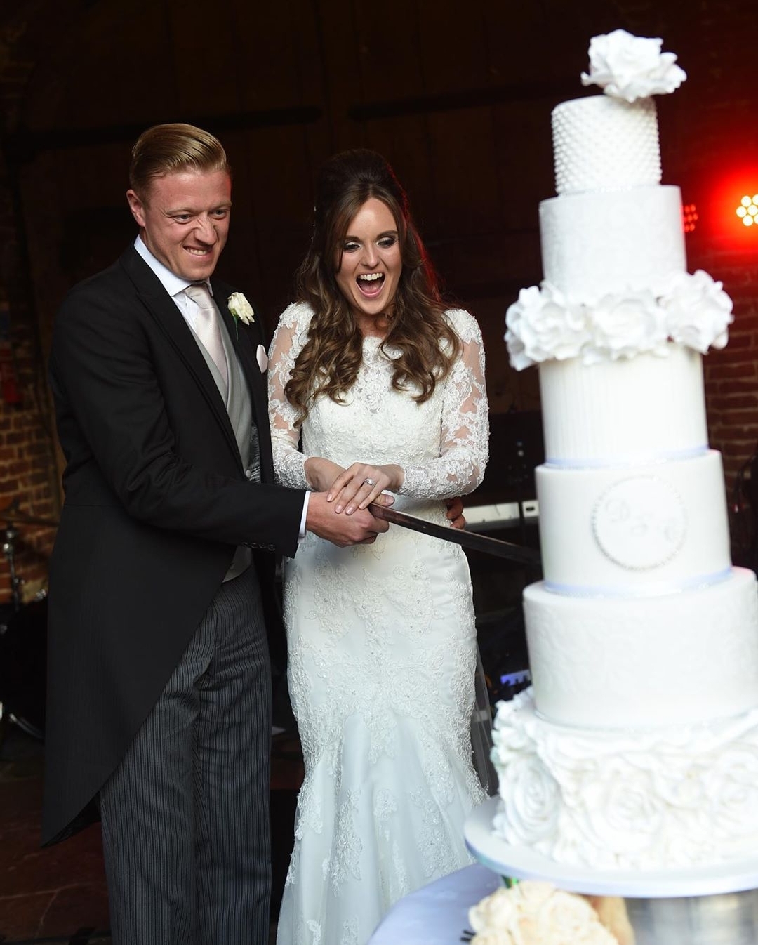 Wedding cake cutting moment