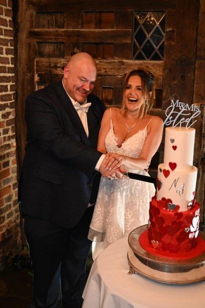 Wedding cake cutting moment