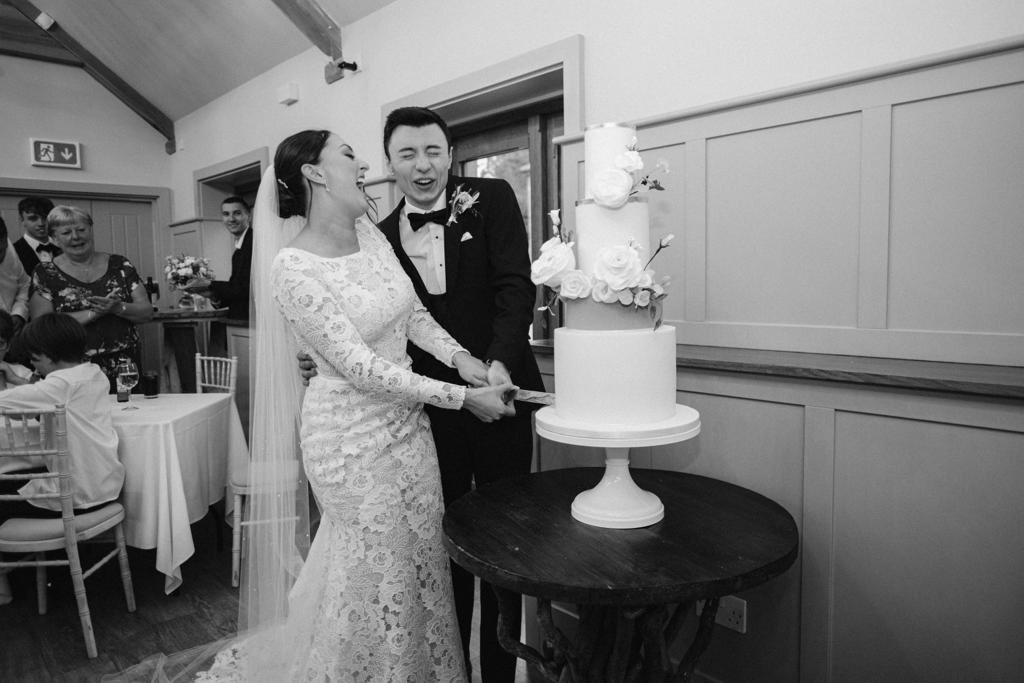 Wedding cake cutting moment